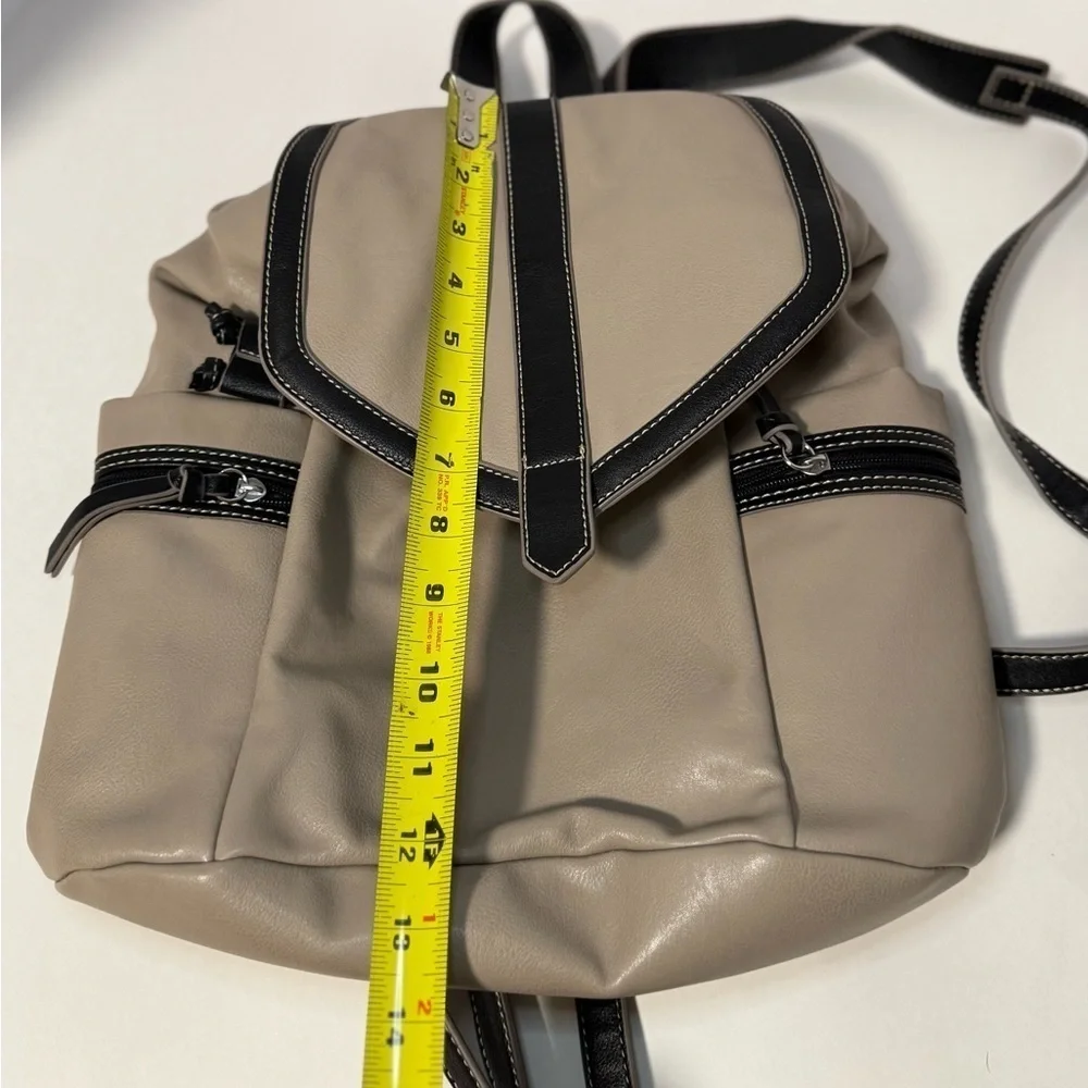 Stylish Tan and Black  Backpack purse in like new condition